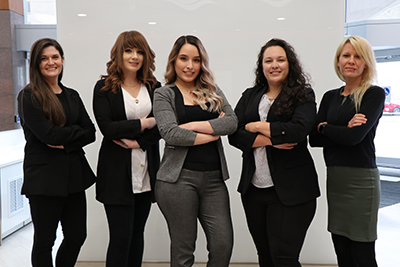 a group of people posing for the camera