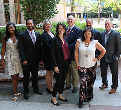 a group of people posing for a photo